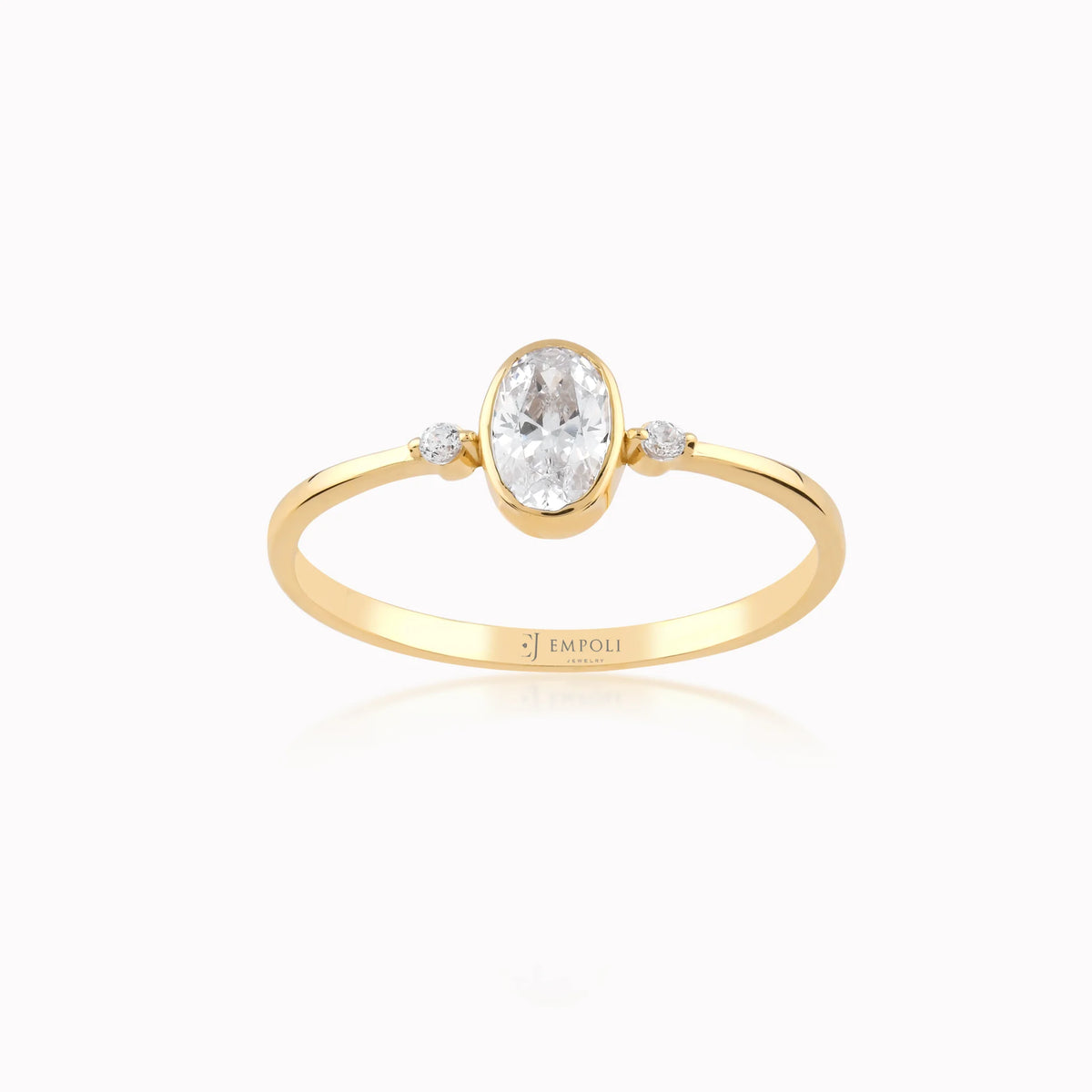 Inel din aur galben 14K cu zirconiu oval cu pietre laterale